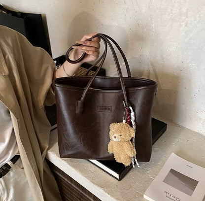 Haut de gamme rétro mode femmes automne fermeture éclair étanche PU sac fourre-tout 2025 nouveau sac à bandoulière grande capacité