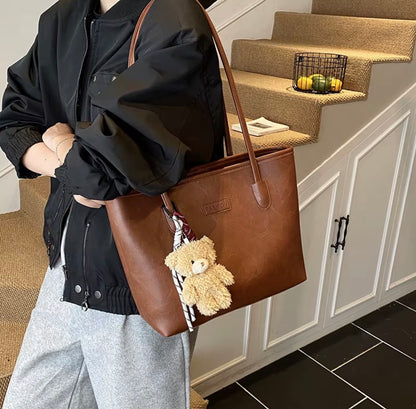 Haut de gamme rétro mode femmes automne fermeture éclair étanche PU sac fourre-tout 2025 nouveau sac à bandoulière grande capacité