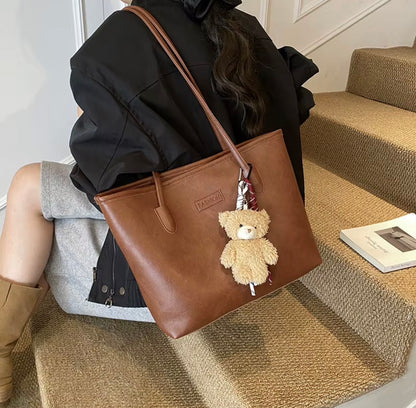 Haut de gamme rétro mode femmes automne fermeture éclair étanche PU sac fourre-tout 2025 nouveau sac à bandoulière grande capacité
