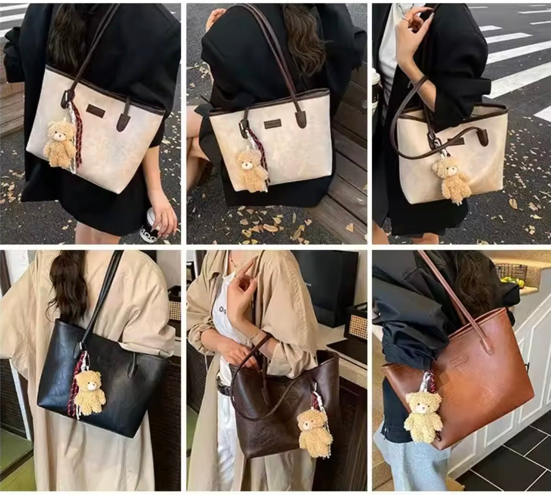 Haut de gamme rétro mode femmes automne fermeture éclair étanche PU sac fourre-tout 2025 nouveau sac à bandoulière grande capacité